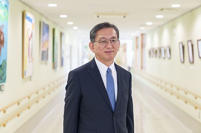 写真：理事長 坂本 仁